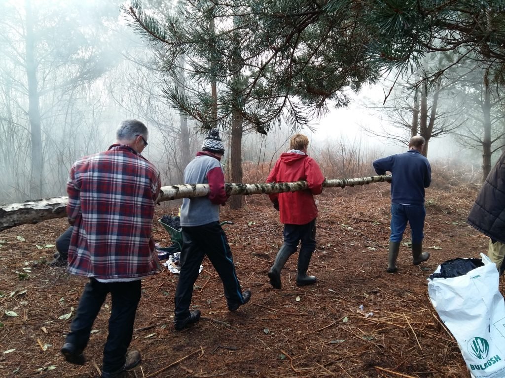 Working woodland volunteers in Harrow Wood
