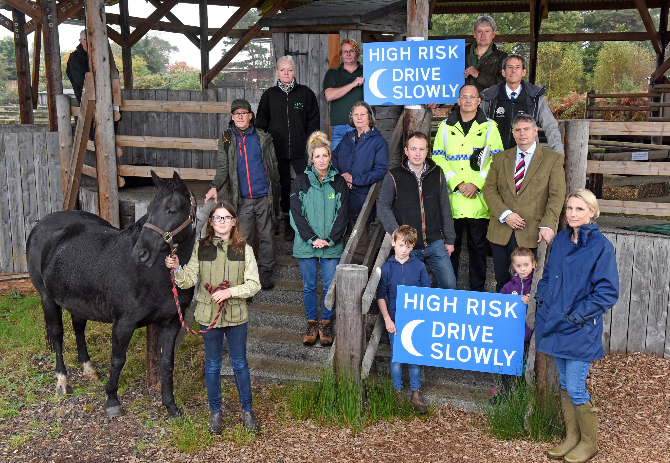 New Forest commoners join representatives of local organisations at Beaulieu Road Sale Yard to appeal to local drivers to slow down as the clocks