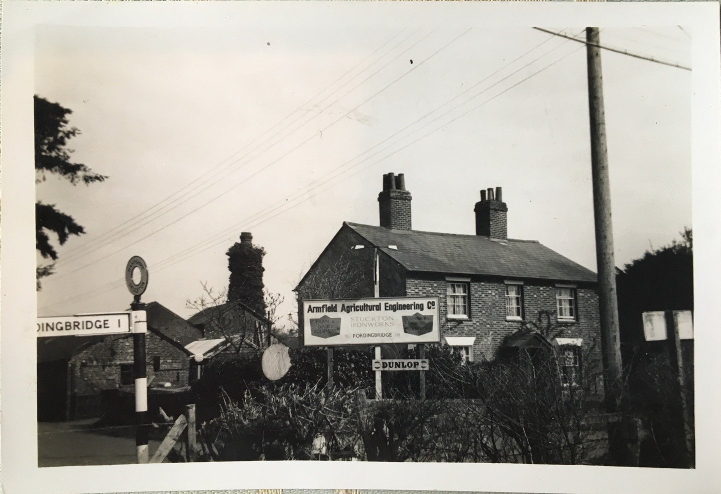 Armfield’s Foundary House in 1959 with chimney of the Cornish Engine House behind. Photo by D A E Cross with permission from Mary Baldwin. Black and white photograph of an historic building