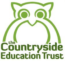 The Countryside Education Trust logo. Green stylised owl over text