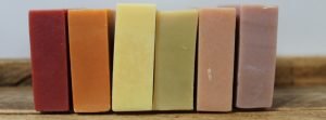 A row of bars of coloured soap