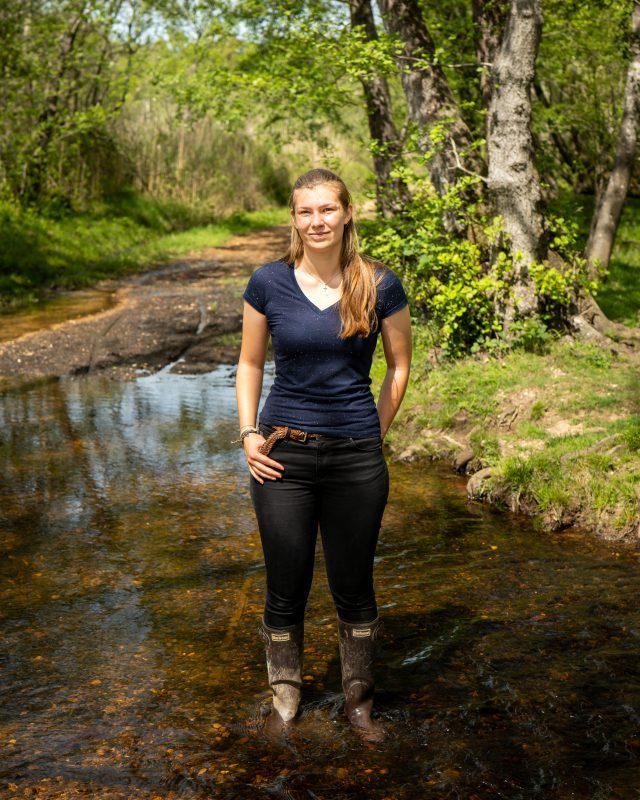 Thea standing in New Forest water way