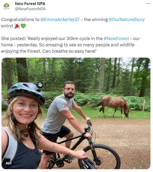 winning picture from @EmmaAckerley27 - the winning #OurNatureStory entry showing emma riding a bike in the Forest with a pony a safe distance away.