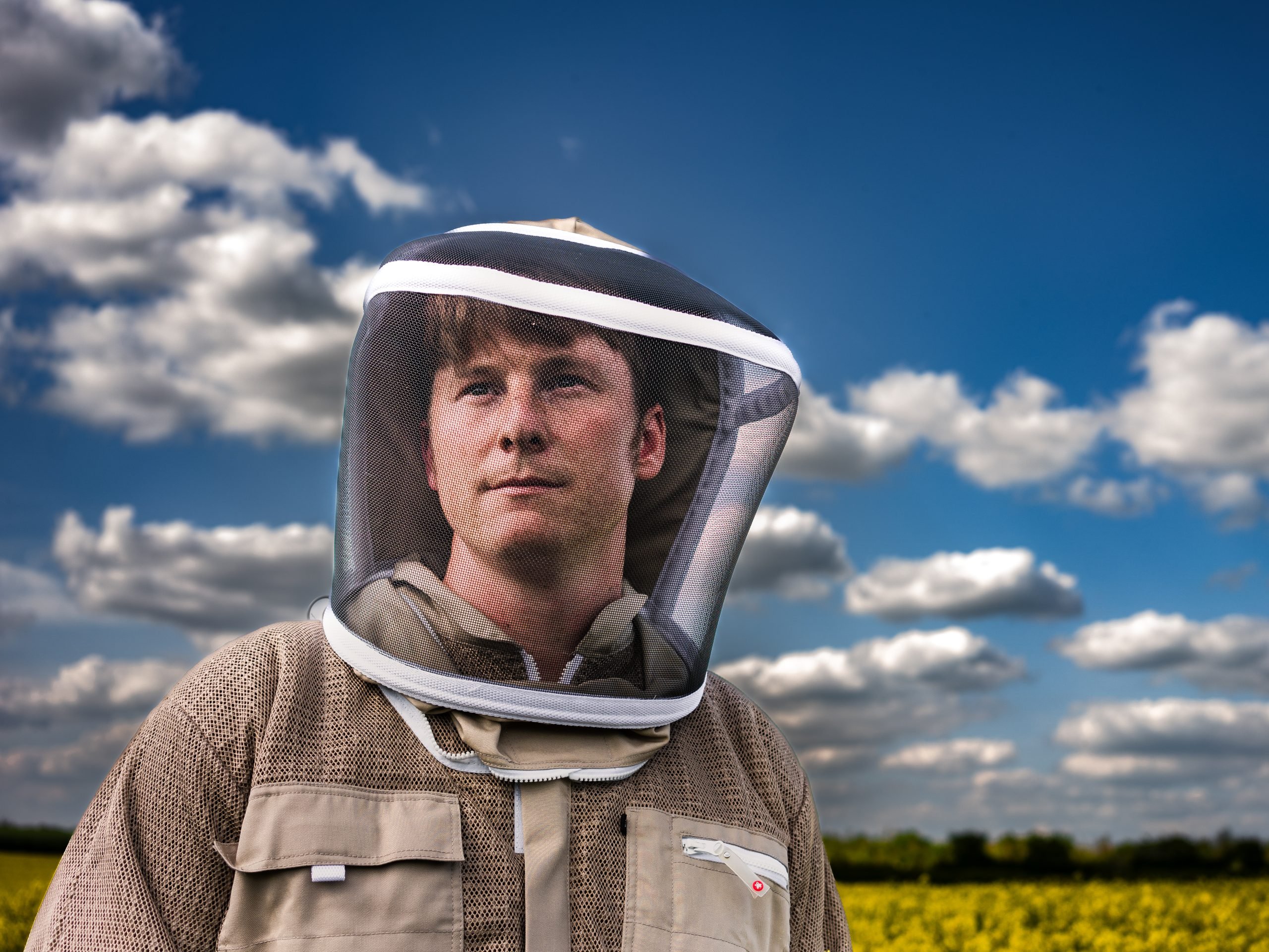 Beekeeper Jack Stride wearing a bee suit