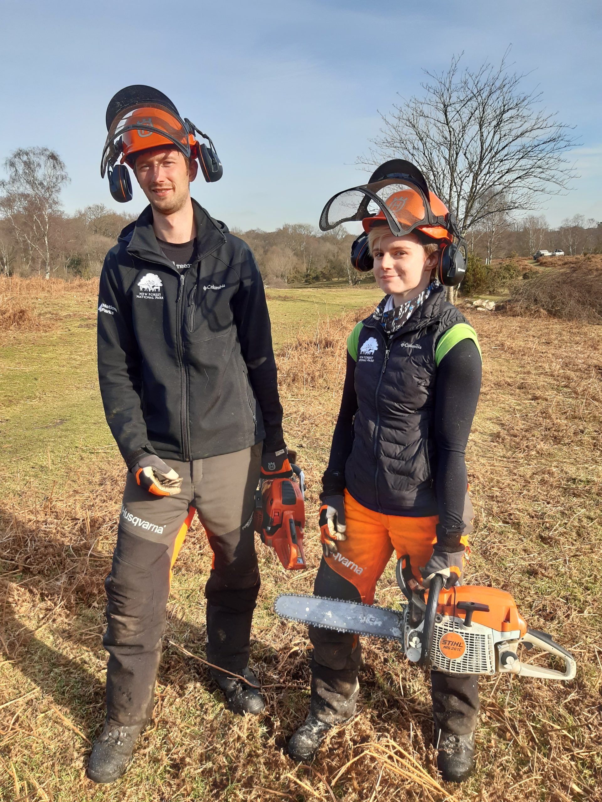 Former New Forest apprentice rangers Jake (left) and Beck (right) with chainsaws Former New Forest apprentice rangers Jake (left) and Beck (right) with chainsaws