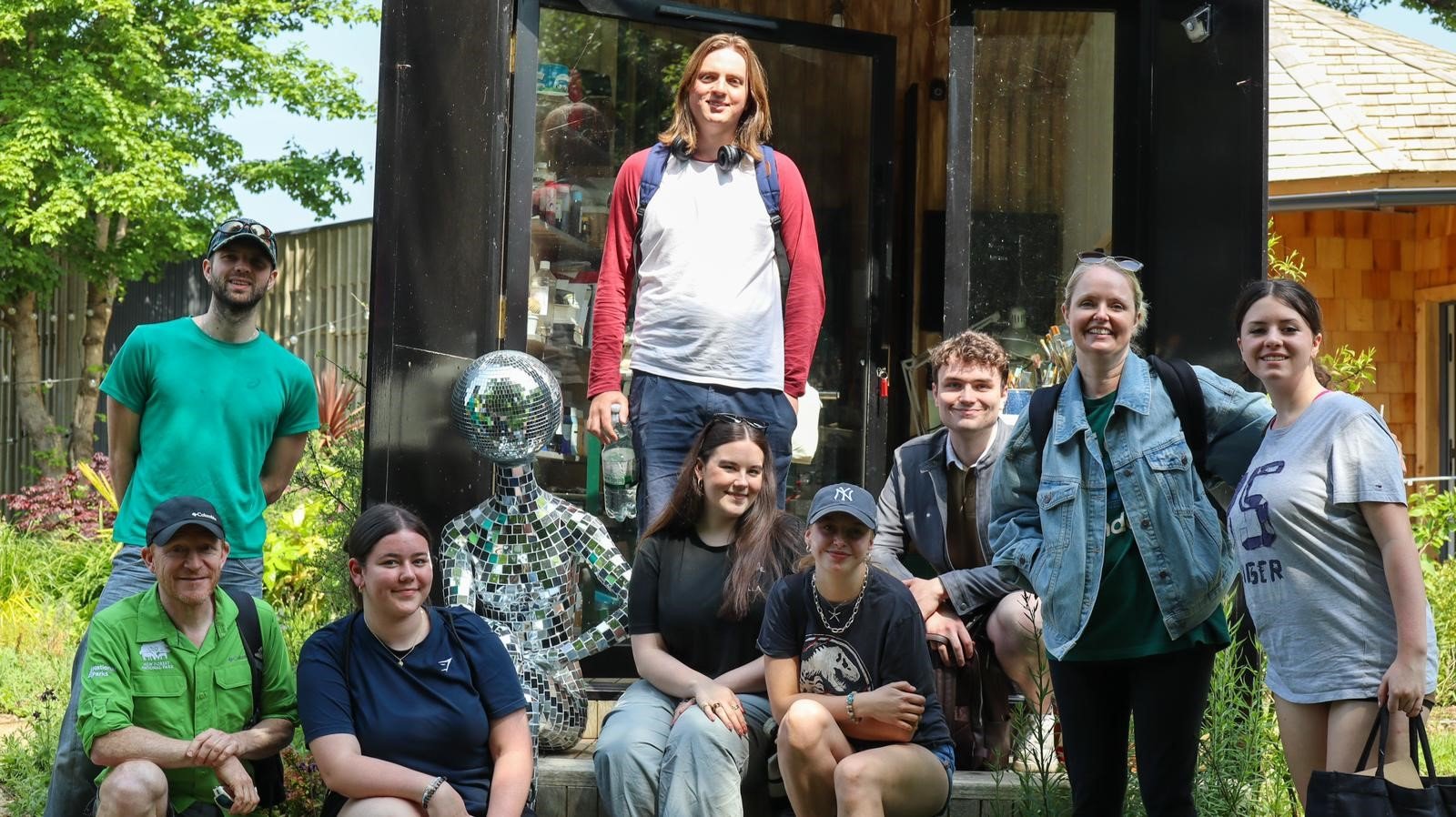 Sustainable art and creative session with New Forest Artist in Residence Jasper Rouwen (credit TFL) A group of young people outside arts charity SPUD's creative workspace, they are with staff from Theatre for Life, the NPA and New Forest Artist in Residence Jasper Rouwen