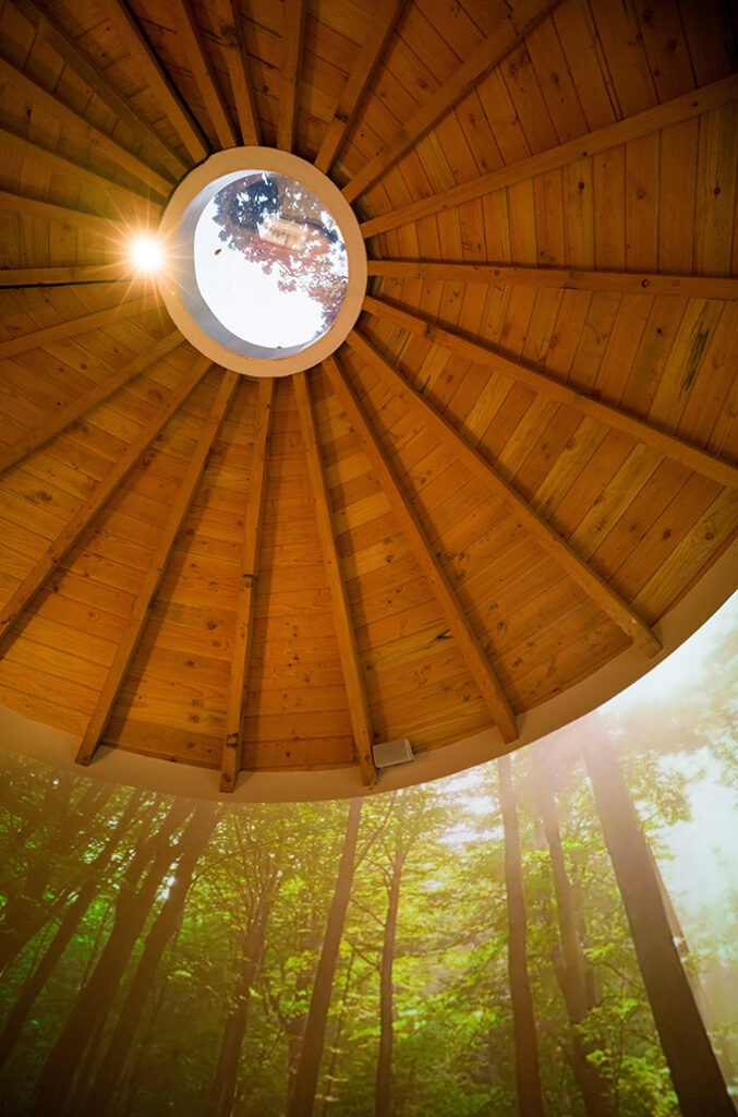 Interior of a wooden roof with round skylight
