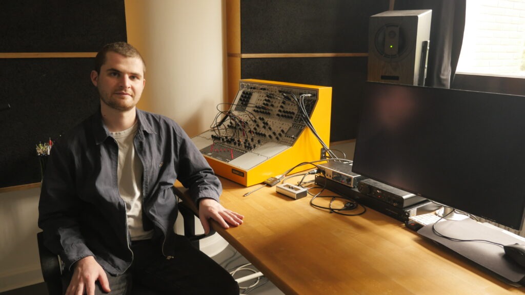 Man sitting in a recording studio