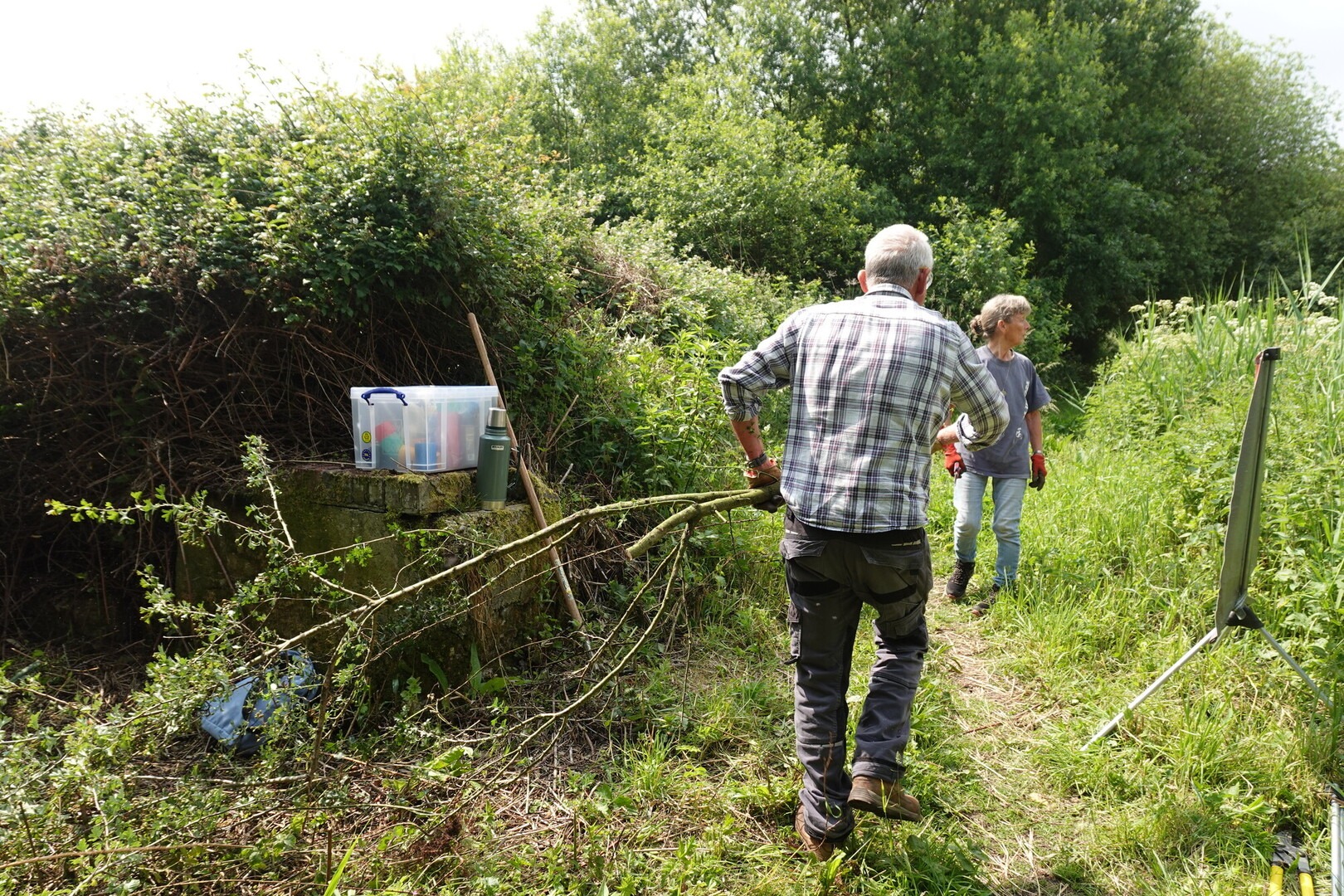Volunteers clearing a railway culvert on the former Breamore Railway Line.