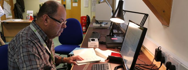 One_of_the_volunteers_at_the_Centre_helping_digitise_the_library___s_resources