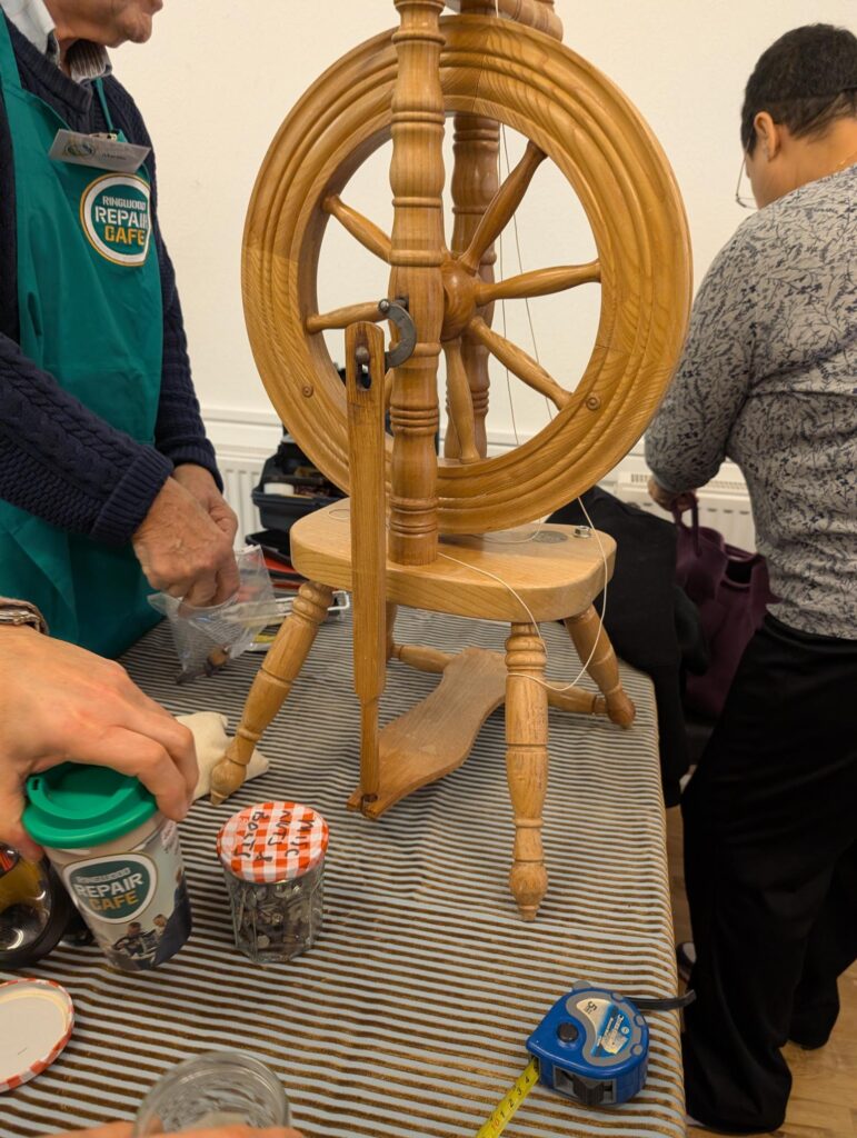 Ringwood Repair Cafe session working on a wooden wheel.