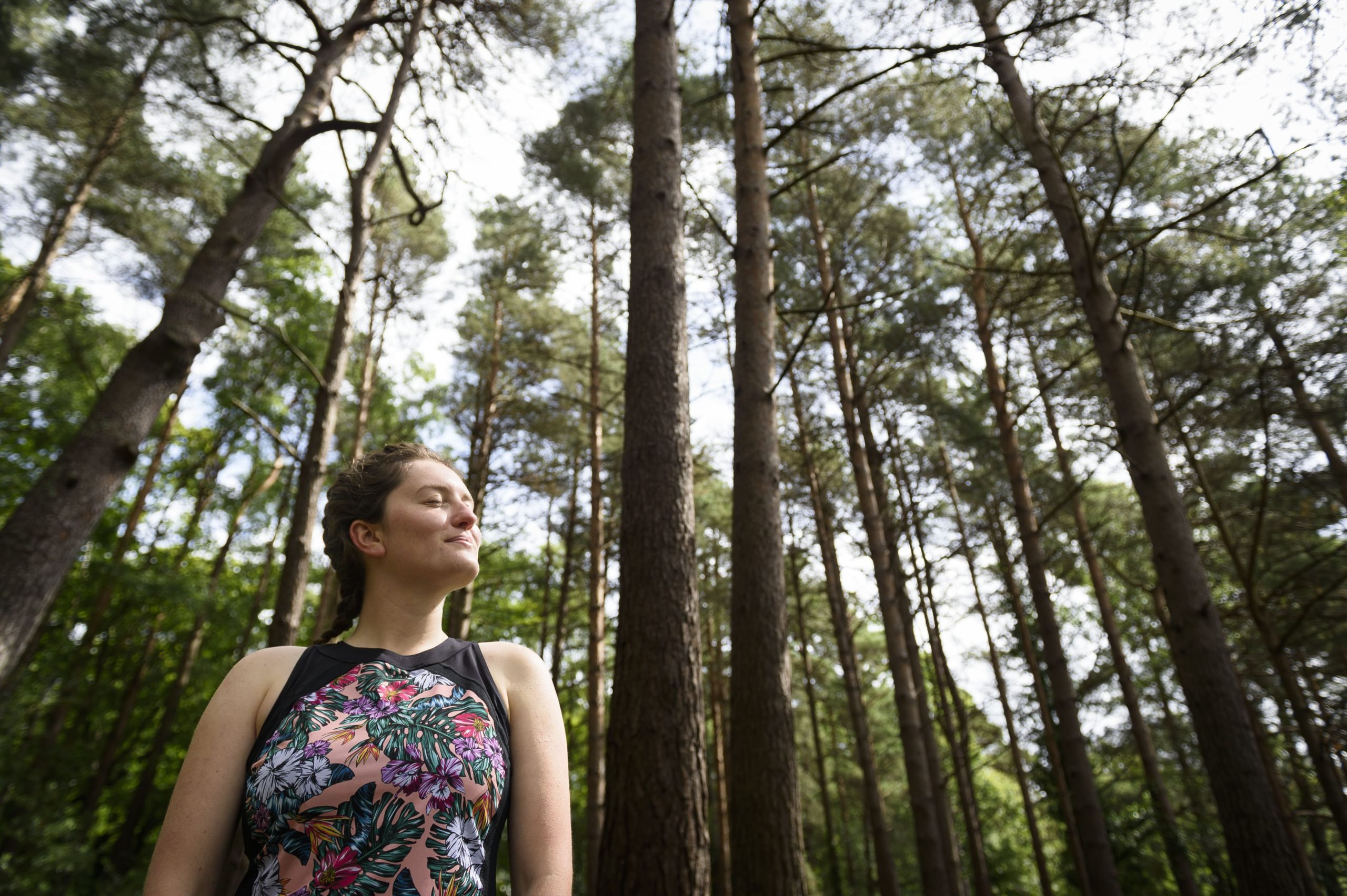 woman looking at trees