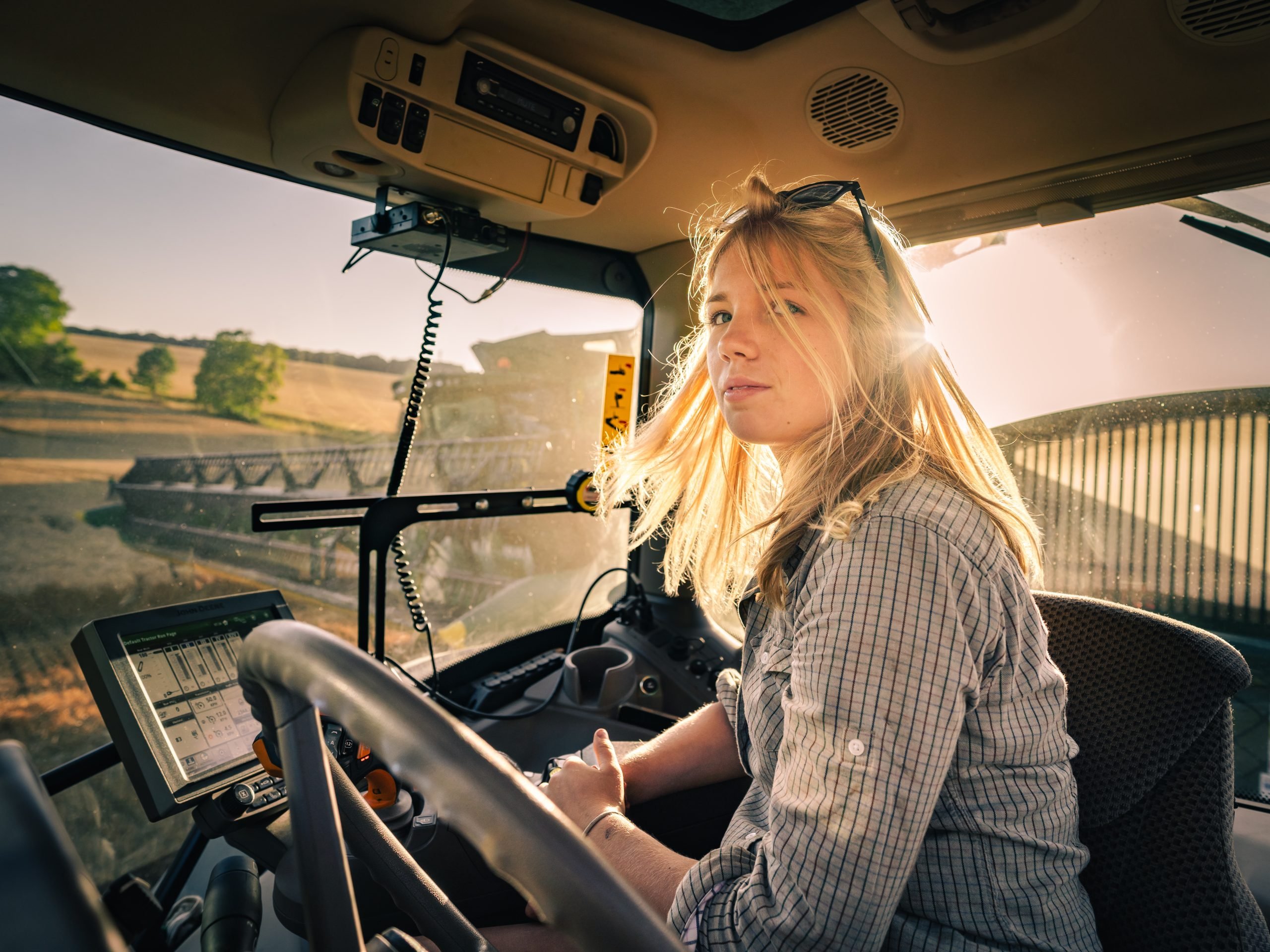 Young farmer Julia Smales in a tractor