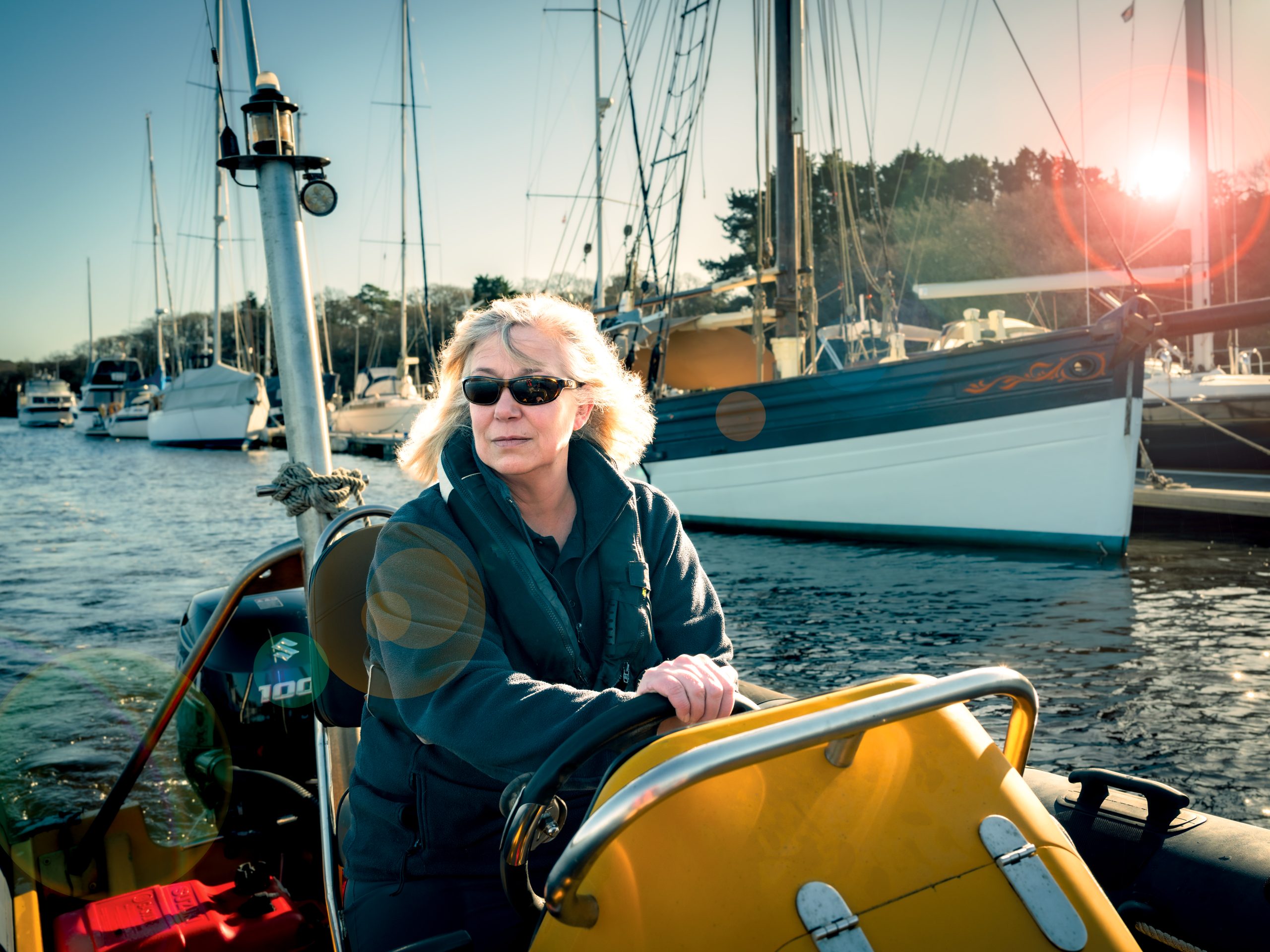 Beaulieu River Harbour Master Wendy Stowe sailing a boat in the harbour