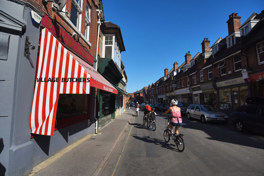 Cyclists on a village high street
