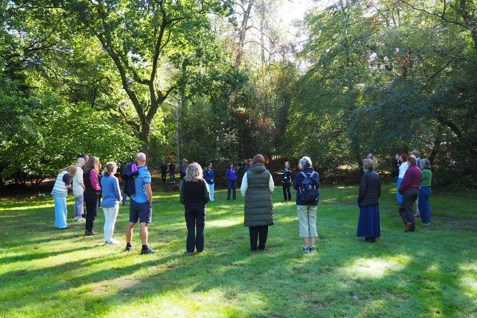 Attendees at the Green Health Hub's autumn Connect and Learn event take part in a mindful nature connection session.
